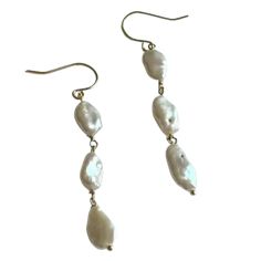 Three tiered earrings featuring white Keshi pearls. Keshi pearls are unique and one of a kind so sizes and shapes will vary. Approx. 2.5" in length. Keshi Pearls, Bridal Earrings, White