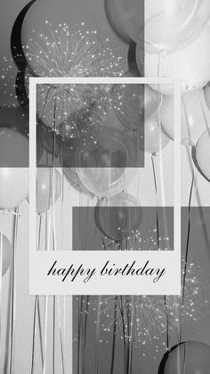 a black and white photo with balloons, confetti and a happy birthday card