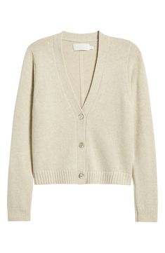 This V-neck cardigan is cut from a cozy wool blend that wraps you up in warm comfort and offers a clean, classic look. Front button closure V-neck Long sleeves Ribbed cuffs and hem 55% merino wool, 25% nylon, 20% cotton Dry clean Imported Beige Wool V-neck Cardigan, Cream Cashmere V-neck Cardigan, Neutral V-neck Cardigan For Work, Beige Cashmere V-neck Outerwear, Everyday Beige V-neck Outerwear, Cream Wool V-neck Outerwear, Everyday Cream V-neck Outerwear, Beige Wool V-neck Outerwear, Classic Cream V-neck Cardigan