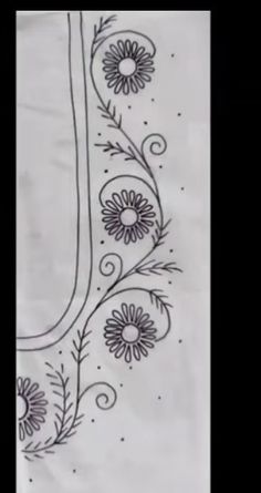 a drawing of flowers and vines on paper