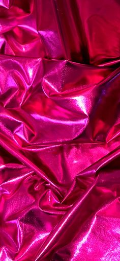 pink shiny material is shown in close up