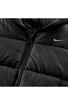 Nike's signature Therma-FIT technology keeps your body temperature regulated in a puffer vest designed with oversized square quilting and a cozy stand collar. The iconic Swoosh embroidered at the chest adds heritage style to your look. Front zip closure with chin guard Stand collar Front snap-welt pockets Water repellent Therma-FIT ADV technology helps regulate body temperature for stay-warm comfort Lined, with 100% synthetic fill 100% polyester Machine wash, line dry Imported Vest Designs, Heritage Fashion, Body Temperature, Puffer Vest, Nike Sportswear, Welt Pockets, Welt Pocket, Stand Collar, Stay Warm