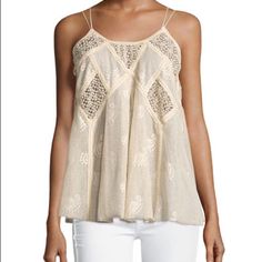 Cotton Tank With Crochet Inserts Chic Crochet Lace Cami Top, Chic Sleeveless Crochet Top, Chic Lace Crochet Cami Top, Feminine Sleeveless Crochet Top With Crochet Trim, Chic Sleeveless Crochet Top With Lace Trim, Chic Lace Tank Top For Spring, Chic Sleeveless Lace Crochet Top, Summer Cream Crochet Top For Layering, Spring Crochet Lace Camisole