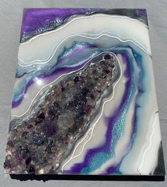 Beautiful sparkling artwork made with crystals!  This beautiful artwork is made with Fluorite gemstone chips, clear quartz crystal chips, clear quartz crystal point and Amethyst stones. Unique Clear Healing Crystals, Clear Healing Crystals, Unique Purple Geodes For Gifts, Unique Purple Geodes For Gift, Handmade Mystical Purple Crystals, Unique Purple Geodes With Natural Stones, Purple Geodes With Natural Stones, Handmade Amethyst Geodes Gift, Unique Purple Natural Stone Geodes