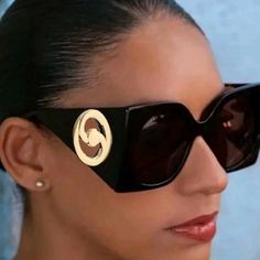 Black Oversized Designer Style Sunglasses With Goldtone Inset. Full Uv Protection. These Glasses Express A Distinguished Comptemporary Spirit With An Eclectic Esthetic With The Goldtone Unique Inset Detail. Features; Frame Shape;Butterfly Frame Material-Acetate Frame Type-Full Rim Lens Feature-Solid Black Color Wipe Clean Imported Comes With Fabric Drawstring Case And Cleaning Cloth. Oversized Black Sunglasses Designer Style Gold Inset Shades Uv Protection Sunglasses Butterfly Shaped Sunglasses Black Retro Sunglasses For Vacation, Black Sunglasses With Mirrored Lenses For Fashion, Elegant Black Sunglasses For Vacation, Modern Black Sunglasses For Fashion, Modern Black Sunglasses, Oversized Black Sunglasses, Shape Butterfly, Shaped Sunglasses, Sunglasses Uv Protection