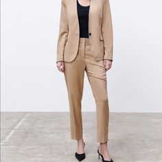 Mid-Waist Trousers With Front Pockets And False Rear Welt Pockets. Featuring Side Vents At The Hems And Metal Hook, Inside Button And Zip Fastening At The Front. Taupe Brown. Brand New With Tags. Full Waist 36” Length 37” Inseam 26” Rise 12” Beige Fall Workwear Pantsuit, Fall Beige Pantsuit For Workwear, Beige Fall Pantsuit For Work, Classic Beige Pantsuit For Work, Fitted Beige Pantsuit For Office, Fitted Khaki Cargo Pants, Beige Fitted Pantsuit With Straight Pants, Fitted Beige Pantsuit With Straight Pants, Beige Fall Pantsuit For Business Casual