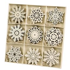 twelve snowflakes are in a box with string