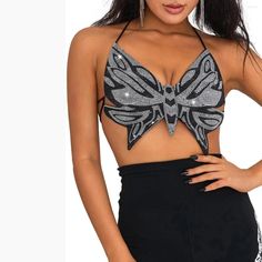 Black Sequin Butterfly Top. Size Medium. Rhinestone Embellished Butterfly Silhouette. Halter Neck/ Cropped. Open Back. Self Tie Closures. Approximate Measurements Pit To Pit 12” Length 15" Fitted Silver Tops With Rhinestones, Silver Rhinestone Tops For Party, Silver Party Tops With Rhinestones, Silver Rhinestone Party Tops, Silver Summer Top With Rhinestones, Embellished Silver Summer Top, Silver Rhinestone Tops For Summer, Silver Rhinestone Evening Top, Swarovski Butterfly