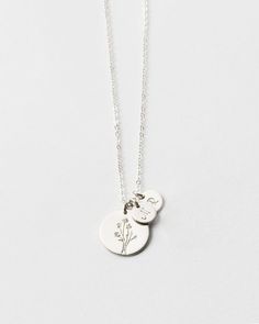 Flowers are our love language—which one speaks to you? Spotlight your favorite bloom with this floral spin on our best-selling Bennett Necklace! Make it extra meaningful with tiny add-on tags personalized with an initial or symbol. Another reason to love this piece: you can add extra initial tags as your story grows! Everyday Jewelry With Flower Charm For Mother's Day, Everyday Charm Necklace With Round Flower Pendant, Personalized Flower Jewelry For Everyday, Personalized Dainty White Gold Charm Necklace, Nature-inspired Personalized Jewelry For Everyday, Delicate Personalized White Gold Charm Necklaces, Delicate Sterling Silver Initial Necklace For Anniversary, Nature-inspired Personalized Everyday Jewelry, Delicate Personalized Charm Necklaces