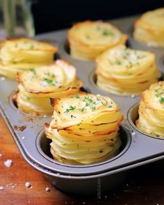 some food is sitting in a muffin tin