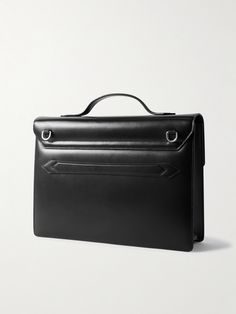 Designed to celebrate Montblanc's centenary, this 'Meisterstück' briefcase is crafted from sleek black leather and can be carried by the top handle or adjustable shoulder strap. It has a roomy interior with space for a 13'' laptop and a dedicated front pocket that nods to vintage pen pouches. High-end Black Briefcase With Detachable Handle, High-end Black Briefcase With Detachable Strap, High-end Briefcase With Top Carry Handle For Office, High-end Office Briefcase With Top Carry Handle, Classic Briefcase With Detachable Handle For Business Trips, Black Briefcase Satchel With Palladium Hardware, Black Briefcase With Detachable Handle For Business Trips, Business Satchel Briefcase With Detachable Handle, High-end Satchel Briefcase For Business