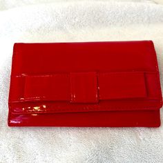 Classic Tri-Fold Ladies Wallet, Red Patent Leather, Id Window, 5 Credit Cards, Checkbook, Cash. Superficial Mars And Creases As Is The Nature Of Patent Leather But Nothing Noticeable, See Photos Carefully. Glad To Answer Your Questions Ahead Of Purchase. Red Formal Bag With Card Slots, Red Clutch Wallet For Formal Occasions, Red Formal Clutch Wallet, Red Evening Wallet, Elegant Red Wallets With Card Slots, Red Bifold Evening Bag, Red Formal Clutch With Card Slots, Elegant Red Clutch Wallet, Red Evening Wallet With Card Slots