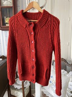 This sweater is super soft and comfortable, handmade of acrylic yarn in a deep rusty colour. It has the original buttons and two front pockets. The sweater has quite a bit of stretch. The measurements, taken with the sweater lying flat, are: shoulder to shoulder, 19 inches; armpit to armpit, 21 inches; sleeves, 25 inches; overall length, 24 inches; bottom edge, 14 inches (with stretchy ribbing). Acrylic Sweater, Vintage Sweaters, Jumpers And Cardigans, Acrylic Yarn, Cardigans For Women, Sweater Outfits, Hand Knitting, Sweater Cardigan, Sweaters & Cardigans