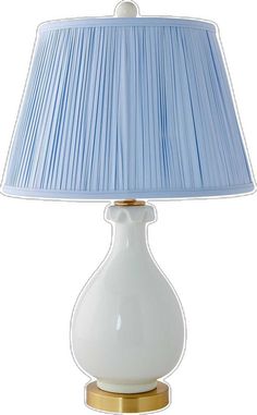 a white lamp with a blue shade on it