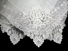 New old stock vintage wedding hanky with a fancy applique and lace border. Although never used, this hanky is slightly imperfect. Please view all photos, as you will see a couple of very small tears in the lace and a small tear in the linen center. Still very pretty, and perfect for a bride-to-be as her something old. All white, measuring 11 inches, and made of linen. Being sold AS IS, and priced accordingly. Elegant Wedding Handkerchief With Lace Work, Elegant Lace Wedding Handkerchief, Elegant Lace Work Handkerchief For Wedding, Elegant Lace Work Wedding Handkerchief, Vintage Embroidered Lace For Wedding, Vintage Lace Trim Handkerchiefs For Wedding, Vintage Wedding Handkerchiefs With Lace Trim, White Victorian Handkerchiefs With Lace Trim, White Victorian Handkerchief With Lace Trim