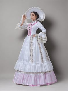 Step into a world of timeless elegance with our "Elegant White and Pink Medieval Dress – Rococo Ball Gown with Floral Embellishments and Lace Trim Plus Size." This exquisite gown captures the romantic essence of the Rococo period, featuring a delicate blend of soft pink and pristine white hues that evoke a sense of gentle sophistication. The dress is adorned with intricately designed floral embellishments that cascade gracefully across the bodice and skirt, adding a touch of botanical beauty. Th White Medieval Wedding Dress With Historical Design, Traditional White Costume Dress, Victorian Dress With Historical Design For Debutante Ball, Victorian Dress For Debutante Ball With Historical Design, Traditional Fitted Dress With Historical Design, Victorian Floor-length Costume Dress, Traditional Wedding Dress With Historical Design, Fitted Princess Dress With Historical Design, Regency Style Medieval Ball Gown