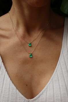 Beautiful 100% natural colombian emeralds in pear shape set in a 14k gold chain. It's a delicate statement piece that looks very flattering.  The emeralds have the characteristic color of the colombian ones, weight 1.20 and 1.27 ct , are not treated in any way and come with a certificate of authenticity.  Chain is 46 cm / 18 inches long and give the option of wearing it slightly shorter since it comes with two hoops to close.  * one of them is now sold. please get in touch for more information on the one available Gold Teardrop Emerald Necklace, Pear-shaped Emerald Necklace, Green Emerald Teardrop Pendant Necklace, Pear-shaped Emerald Necklace Fine Jewelry, Pear-shaped Emerald Gemstone Necklace, Green Drop Emerald Necklace For May Birthstone, Green Pear-shaped May Birthstone Necklaces, Green Teardrop Necklace For May Birthstone, Pear-shaped Emerald Necklace In Yellow Gold For Gift