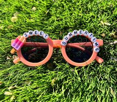 Are you looking for the perfect, personalized gift for your little one? Look no further!  These sunnies are perfect for any occasion! Birthdays, baby showers, party favors, class parties, holidays, or every day wear.  Fits most children 1-6 years old.  HOW TO ORDER: Step 1: Pick your frame color from drop down menu. Step 2: Pick popsicle color from drop down menu.  *Listing photo is the #4 Peach frame with the Option 1 popsicle. *Color may vary slightly from photos. Since each item is made to or Birthday Sunglasses, Toddler Gift, Sweet Summertime, End Of The Year, Toddler Gifts, Baby Showers, Custom Name, Sunglasses Accessories, Sunnies