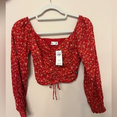 Size Xs Red Cropped Blouse For Spring, Casual Red Tops For Spring, Red Floral Print Tops For Fall, Fall Floral Print Red Top, Fall Red Floral Print Tops, Trendy Red Top For Spring, Trendy Red Tops For Spring, Spring Red Fitted Blouse, Fitted Red Blouse For Spring