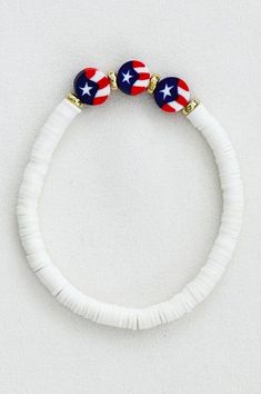 Multicolored Heishi rubber flat disc bracelet. Polymer soft clay disk beaded stretch bracelet. Adjustable White Stretch Bracelet For Summer, White Heishi Beads Bracelet, White Heishi Beads Round Beaded Bracelets, White Heishi Beads Round Bracelets, Flexible White Bracelets For Summer, Adjustable Round Heishi Beads Bracelet, Adjustable Heishi Beads Bracelet, Blue Bead Bracelet, Patriotic Bracelet