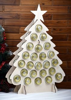 a christmas tree made out of beer cans