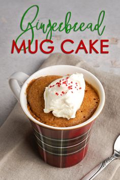 a mug cake with white frosting and sprinkles