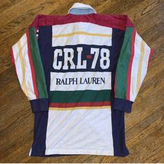 Chaps Ralph Lauren Vintage Patchwork Colorful 90s Polo Rugby Collared Long Sleeve In Fantastic Pre-Loved Condition!!! Super Comfortable And Stylish Vintage Chaps And Ralph Lauren Collab Colorful , Striped , Patchwork , Full Body , Rare Please See The Oil Stains On The Front , Not Noticeable And The Small Dots On The Sleeve Size M In Men's , Tall Measurements Lying Appx Flat Armpit To Armpit 21 1/2" Length From Back 31" Sleeve 21 1/2" Sporty Ralph Lauren Tops For Streetwear, White Long Sleeve Ralph Lauren Tops, Sporty Ralph Lauren Graphic Print Tops, Sporty Ralph Lauren Top With Graphic Print, Sporty Ralph Lauren Tops With Graphic Print, Sporty Graphic Print Tops By Ralph Lauren, Multicolor Long Sleeve Shirt For Streetwear, Ralph Lauren Long Sleeve Streetwear Tops, Ralph Lauren Multicolor Spring Shirt