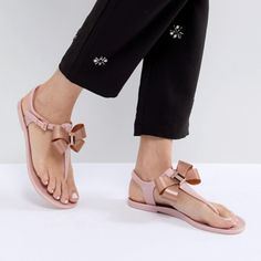 Step Into Holiday Mode With The Camaril Jelly Sandals. A Signature Ted Style, They Come With Looped Bow Detailing That’s Sure To Make Them The Prettiest Pair On The Beach. Never Worn Details: - Ted Baker Footwear Collection - Jelly - Bow Detail - Ted Baker-Branded - Buckle Fastening Care & Fabric: - Fabric Content: Upper: 100% Thermoplastic Polyurethane; Lining: 100% Thermoplastic Polyurethane; Sock: 100% Thermoplastic Polyurethane; Sole: 100% Thermoplastic -Polyurethane Pink Round Toe Slingback Sandals For Summer, Feminine Pink Round Toe Sandals, Trendy Pink Slingback Sandals With Round Toe, Trendy Pink Round Toe Slingback Sandals, Pink Slingback Sandals With Open Toe For Spring, Pink Flat Heel Jelly Sandals For Summer, Pink Round Toe Jelly Sandals For Summer, Pink Open Toe Slingback Sandals For Summer, Pink Ankle Strap Jelly Sandals For Party