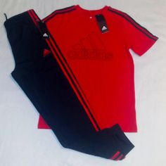 Brand New Never Worn With Tags. Adidas Set Includes A Red Short Sleeve Cotton Blend Tee Top With Classic Adidas Inscription On Front In Black And 3 Stripes Down Each Sleeve. Bottoms Are Black Polyester Blend Pocketed Design With Elastic Waistline And Classic Adidas 3 Pale Logo And Inscription On Left Leg With Banded Leg Opening And 3 Red Stripes Down Each Outer Leg. Set Fits Medium Boys Youth (10-12 Years). Any Questions, Please Contact Me. Thanks! Cotton Sport Sets With Graphic Print, Cotton Graphic Print Sports Sets, Sports Graphic Print Crew Neck Sets, Graphic Print Crew Neck Sports Set, Casual Red Cotton Sets, Cotton Sports Sets With Short Sleeves, Short Sleeve Cotton Sports Set, Cotton Crew Neck Sportswear Sets, Cotton Sportswear Set With Crew Neck