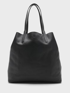 East-West Leather Tote | Banana Republic Modern Leather-backed Tote Satchel, Daily Use Leather-lined Hobo Tote Bag, High-end Soft Leather Tote Bag, Sleek Textured Leather Tote Bag, Modern Satchel Tote With Silver-tone Hardware, East West, Banana Republic, Leather Tote, Zip Pockets