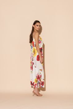 This is one Bouquet you won't want to throw away! Vibrant blooms of flora and fauna adorn this long chemise in our signature Polysilk fabric. Dance the night away, layer it up for brunch, or lounge in luxe - the occasions are endless in this beautiful, blossoming statement piece. Machine washable for ease of care. Chic Floral Print Maxi Dress For Daywear, Chic Floral Print Slip Dress For Summer, Spring Floral Print Slip Dress For Day Out, Summer Silk Slip Dress With Floral Print, Floral Print Slip Dress For Spring Day Out, Summer Floral Print Maxi Slip Dress, Floral Print Maxi Slip Dress For Summer, Summer Floral Print Slip Dress For Brunch, Maxi Length Floral Print Slip Dress For Garden Party