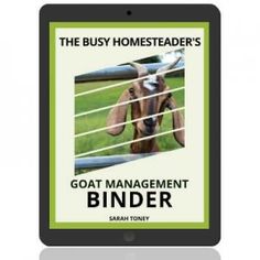 the goat management binder is shown in front of a tablet computer with an image of a goat behind it