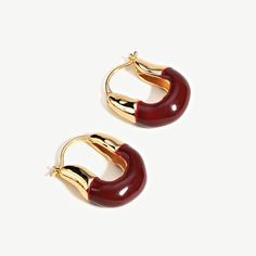 DetailsHoop Size: 24.8 x 20mmWidth: 6.4 mmWeight: 13gMaterialsMetal: Thick 18k Gold Plated (S925 Stud)Other：EnamelProductsMake a statement with Love in Bloom Red Enamel Hoop Earrings. These earrings feature a beautiful hoop design with a vibrant red enamel coating on the bottom half of the earring. The bright red color represents passion. love. and romance. making these earrings the perfect gift for your special someone. Crafted with high-quality materialsã€?Add a pop of color to your outfit and Love In Bloom, Hoop Design, Love And Romance, In Bloom, Vibrant Red, Bright Red, Red Color, Color Pop, 18k Gold