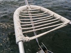 the rope is attached to the boat in the water