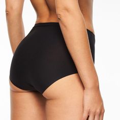 This ultra comfortable Soft Stretch Seamless Full Brief is made to comfortably accommodate anyone from S-L. Made entirely of soft stretch knit, this style adapts to your body for a custom fit. Flat bonded finishes make this style seamless and invisible under any outfit. Nontransparent fabric ensures a modest, comfortable fit High-rise Seamless smooth waistband and leg openings Designed in France Style #2647 Solid Stretch Shapewear With Seamless Construction, Solid Color Stretch Shapewear With Soft Touch, Basic Seamless Compressive Bottoms, Basic Compressive Seamless Bottoms, Seamless Solid Color Elastane Swimwear, Seamless Solid Swimwear In Elastane, Solid Seamless Swimwear In Elastane, Supportive Micro-elastic Seamless Shapewear, Micro-elastic Solid Shapewear For Sports