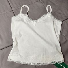 Shein Ez Wear Tank Top. New With Tags, Size Extra Small (Xs)! White In Color, Spaghetti Straps With Lace On The Top And Bottom Of The Tank Top. See Photos For Pit To Pit Measurement And Condition. Sold As-Is. Smoke-Free, Dog-Friendly Home. White Tank Top Coquette, Lace Lined Tank Top, White Tank Top With Lace, Tank Tops With Lace, Girly Tank Tops, White Tank Top With Lace Trim, White Lace Tank Top Outfit, White Cami Top Outfit, Lace Tank Tops Outfit