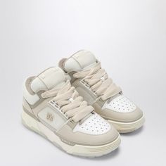 White and beige leather and textile low top trainer from Amiri featuring a perforated round toe, lace-up fastening, padded logo tongue, rear lettering logo and rubber sole.Gender: MenMaterial: 100% Leather / Rubber soleColor: BeigeMade in: VNProduct ID: AMFOSR1037LE/P_AMIRI-157*Import tax/duty will be calculated at checkout (If applicable) Beige Sneakers, Men Cream, White And Beige, Lettering Logo, Selfie Ideas, Sneaker Wedge, Pump Sandals, White Beige