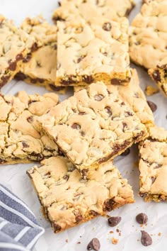 chocolate chip cookie bars cut into squares and stacked on top of each other