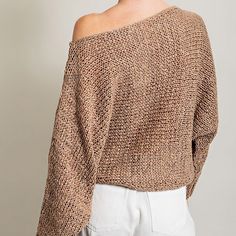 Elevate your casual style with the Loose Fit Knit Top. This solid long sleeve knit sweater top offers a unique twist with its boat neckline, creating a cold shoulder effect that's both trendy and comfortable. Its relaxed and loose fit body ensures all-day comfort, making it perfect for various occasions. Whether you want to keep it casual with jeans or dress it up for a fancier look with a dress, this versatile top has got you covered. It's a must-have addition to your wardrobe, offering both st Slouchy Chic Chunky Knit Sweater, Oversized Chic Textured Knit Top, Slouchy Chunky Knit Top, Trendy Off-shoulder Knit Top, Oversized Textured Knit Top, Casual Slouchy Chunky Knit Cropped Sweater, Trendy Slouchy Knit Sweater, Spring Knit Boat Neck Top, Spring Boat Neck Knit Top