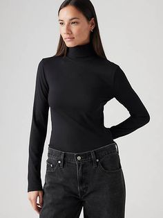 Your everyday, go-to top;but softer. Our Dreamy Turtleneck Top features easy long sleeves and a figure-hugging slim fit. The best part? It was made with soft-to-the-touch fabric for all-day comfort. Your everyday, go-to turtleneck;but softer Cut with a slim fit Dreamy, right? This garment was crafted with soft-to-the-touch fabric for all-day comfort. Stretch Elastane Long Sleeve Top For Fall, Sleek Long Sleeve Tops For Fall, Winter Second-skin Long Sleeve Turtleneck, Second-skin Long Sleeve Turtleneck For Winter, Trendy Second-skin Tops For Fall, Trendy Form-fitting Tops For Fall, Sleek Slim Fit Long Sleeve Tops, Sleek Fitted Long Sleeve Top For Fall, Basic Stretch Fall Tops