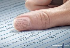 a person's finger with writing on it