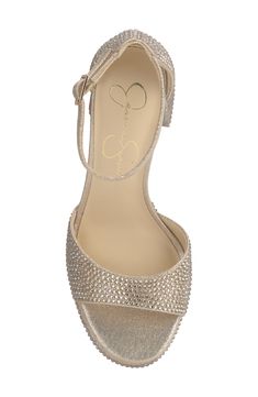 Tonal rhinestones add eye-catching glamour to a party-ready sandal lofted by a chunky platform and flared block heel. 3 1/2" heel; 1/2" platform Adjustable ankle strap with buckle closure Textile upper/synthetic lining/rubber sole Imported Glamorous Heels With Heel Loop And Round Toe, Party Wedge Sandals With Padded Block Heel, Party Wedge Sandals With Heel Strap And Block Heel, Glamorous Platform Sandals For Formal Occasions, Glamorous Platform Sandals For Formal Events, Low Heel Platform Party Heels, Gold Rhinestone Wedge Sandals For Party, Party Platform Heels With Low Heel, Glamorous Formal Platform Sandals