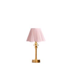 a pink lamp with a gold base on a white background, it has a pleated shade