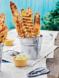 some food is sitting in a bucket on a table