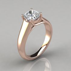 a gold ring with a diamond in the center on a gray background, 3d image