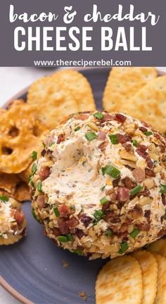 bacon and cheddar cheese ball on a plate with crackers