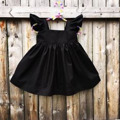 Fluffy sleeves NO bow dress, black flutter sleeves dress, simple black dress, flower girls dress, fall toddler dress, thanksgiving outfits by SweetWhitePeony on Etsy https://www.etsy.com/listing/198253733/fluffy-sleeves-no-bow-dress-black Black Flutter Sleeve Dress For Spring, Fitted Twirl Dress With Flutter Sleeves For Dress-up, Black Flutter Sleeve Summer Dress, Black Dresses With Ruffles And Butterfly Sleeves, Black Dress With Ruffles And Butterfly Sleeves, Black Flutter Sleeve Dresses With Ruffles, Girl Frock Design Cotton, Bow Dress Black, Fall Flower Girl Dresses