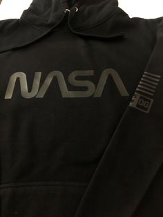 Nasa Black on Black Hooded Sweatshirt by threadsonfire.com Black Cotton Hoodie With Logo Print, Black Logo Print Hoodie Sweatshirt, Black Hoodie Sweatshirt With Logo Print, Black Hooded Sweatshirt With Logo Print, Urban Black Sweatshirt With Branding, Black Urban Sweatshirt With Branding, Black Cotton Sweatshirt With Kangaroo Pocket, Black Techwear Hoodie With Letter Print, Black Fleece Hoodie With Letter Print