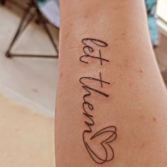 a woman's arm with a tattoo that reads, love and family on it