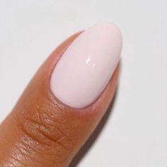 A soft milky pink. The duo includes: 1 Soak-Off Gel Size: 0.5 fl oz 1 Nail Lacquer Size: 0.5 fl oz Color Accuracy: The duo comes with 1 lacquer and 1 gel in matching colors. We do not guarantee matching exact colors due to differences in formulation, ingredients, and batch. Benefits: Lasts up to 21 days LED and UV cured Made in USA Wide range of colors Fused with vitamins that make nails stronger, healthier and stunning for weeks HOW TO: Gel Polish Application - Prep your nails - Remove old nail polish and oil. Push back cuticles gently using a cuticle pusher. Apply 1st thin layer of base coat and cure under a lamp for 30-45 seconds Apply a thin layer of the DND Gel Polish. Cure under UV/LED lamp for 30-60 seconds. Repeat 2-3 coats if needed. Apply a top coat and cure under UV/LED for 30-4 Nail Polish Trends 2024 Summer, Dnd Little Miss Pointe, Natural Nails Dnd Gel, Summer Gel Manicure Colors, Dnd Gel Neutral Colors, Super Light Pink Nails